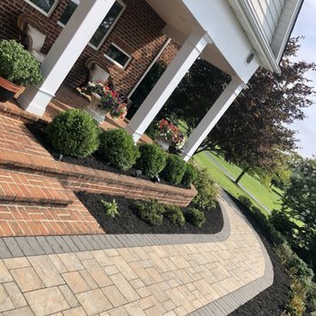 Henriques Landscapes - Mulching/Pruning - Landscaping Near Me