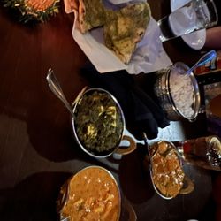 Taj Mahal Restaurant - Saag Paneer, matter paneer, and vegetable coconut with pesto naan...I'm in heaven!