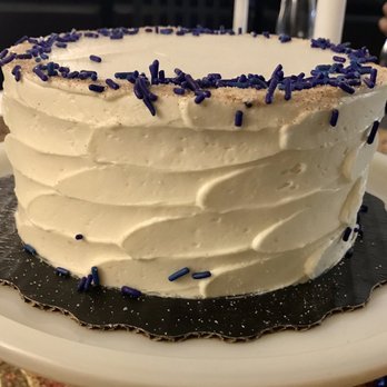 Bakeshop - Earl Grey cake with vanilla buttercream, indigo sprinkles, and cinnamon dusted on the rim - Desserts Near Me - Arlington, Virginia