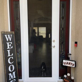 Den Defenders - Front door screen with side screen over stained glass windows. - Chimney Sweeps Near Me Den Defenders - Front door screen with side screen over stained glass windows. - Chimney Sweeps Near Me