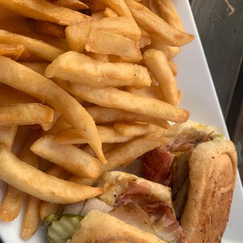 Conchy Joe's - Cuban sandwich with fries - Seafood Near Me - Jensen Beach, Florida Conchy Joe's - Cuban sandwich with fries - Seafood Near Me - Jensen Beach, Florida
