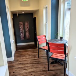 Rest A Boutique Hotel - Bridge corridor with table