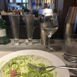 Artisans Gallery - Carbonara and multiple bar glasses and bottle of gin of which none were mine.