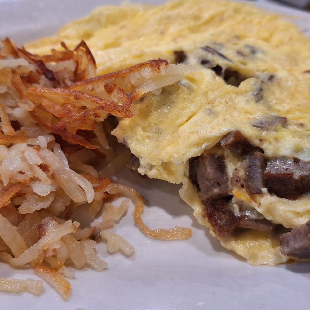Julwin's Restaurant - Traditional omelet sausage and cheddar with hashbowns - Breakfast & Brunch Near Me - Fairhope, Alabama Julwin's Restaurant - Traditional omelet sausage and cheddar with hashbowns - Breakfast & Brunch Near Me - Fairhope, Alabama