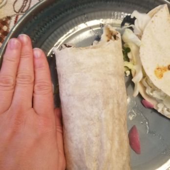 Moe's Southwest Grill - I have super tiny hands being 5 foot 0. This is supposed to be a full-size homewrecker burrito. I cut the top for crossection photos. - Tex-Mex Near Me - Centereach, New York Moe's Southwest Grill - I have super tiny hands being 5 foot 0. This is supposed to be a full-size homewrecker burrito. I cut the top for crossection photos. - Tex-Mex Near Me - Centereach, New York