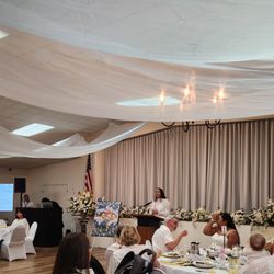 Madison Avenue Florist - We accented our speaking space beautifully with these arrangements!