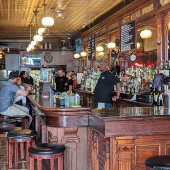 Ryan's Wake - a bar with people sitting at the bar - Irish Pub Near Me - Troy, New York Ryan's Wake - a bar with people sitting at the bar - Irish Pub Near Me - Troy, New York