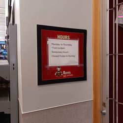 Ben's Soft Pretzels - Closed signs with hours and a screenshot where they are still taking orders and payment on closed days
