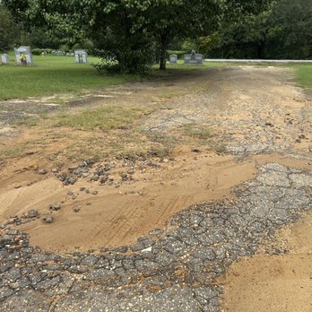 Gardens of Memory - The "road" that I had to use. Nothing but broken pieces, dirt and pot holes. - Funeral Services & Cemeteries Near Me - Dothan, Alabama Gardens of Memory - The "road" that I had to use. Nothing but broken pieces, dirt and pot holes. - Funeral Services & Cemeteries Near Me - Dothan, Alabama
