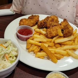 The Place Tavern - Chicken fingers w fries & a huge Cole slaw $15.50. Don't like pre-portioned condiments though.