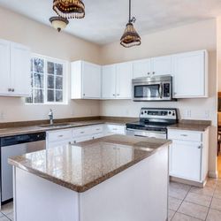 Piantedosi's - Painted kitchen cabinets and restored to a modern upgraded look.