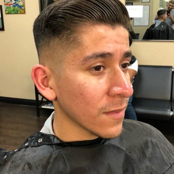 Golden Edge - Trim on top with a skin fade on the side. - Barbers Near Me - Lakewood, California Golden Edge - Trim on top with a skin fade on the side. - Barbers Near Me - Lakewood, California