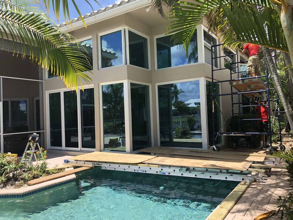 Slide of All Impact Windows and Doors