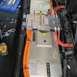 Photo of EVFixMe - Costa Mesa, CA, United States. Model S gen 2 slave charger addition into single charger car to enable dual charger to charge at up to 80A