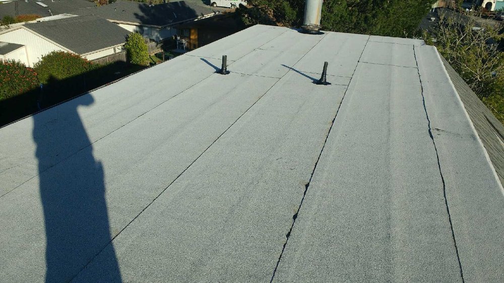 Slide of Eddies Roofing