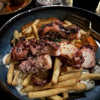 The Hidden Flask - Octopus and chorizo over what was supposed to be potatoes - Cocktail Bars Near Me - South Bound Brook, New Jersey