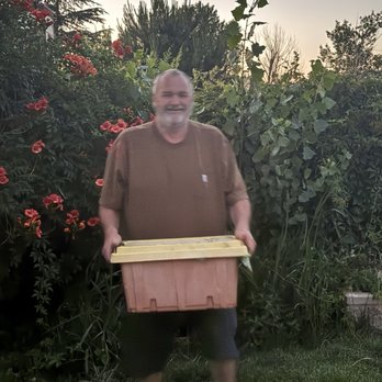 Newsom Honey Farm - John Newsom with the bee box after successfully gathering up the hive - Honey Near Me - Tehachapi, California Newsom Honey Farm - John Newsom with the bee box after successfully gathering up the hive - Honey Near Me - Tehachapi, California