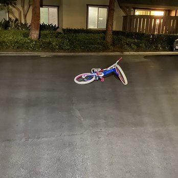 Woodbridge Pines Apartment Homes - bicycle in the middle of the driveway - Apartments Near Me - Irvine, California Woodbridge Pines Apartment Homes - bicycle in the middle of the driveway - Apartments Near Me - Irvine, California