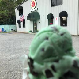 Dbl scoop of mint chocolate chip in chocolate dipped cone Dbl scoop of mint chocolate chip in chocolate dipped cone