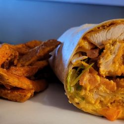 Southpaw Brewing Company - Half of a Buffalo chicken wrap & sweet potato fries. Delicious