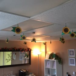 Kitsap Therapeutic Massage - Every month we decorate the ceiling.  These are fall August sunflowers