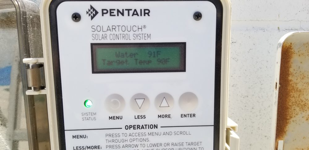 Slide of Pool Solar and Roofing