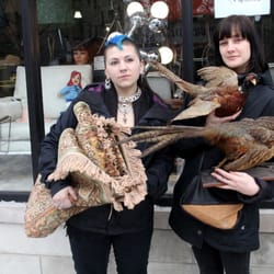 Two customers brought home a 1970s collar necklace (she's already wearing it!), rug and a pair of taxidermy pheasants.