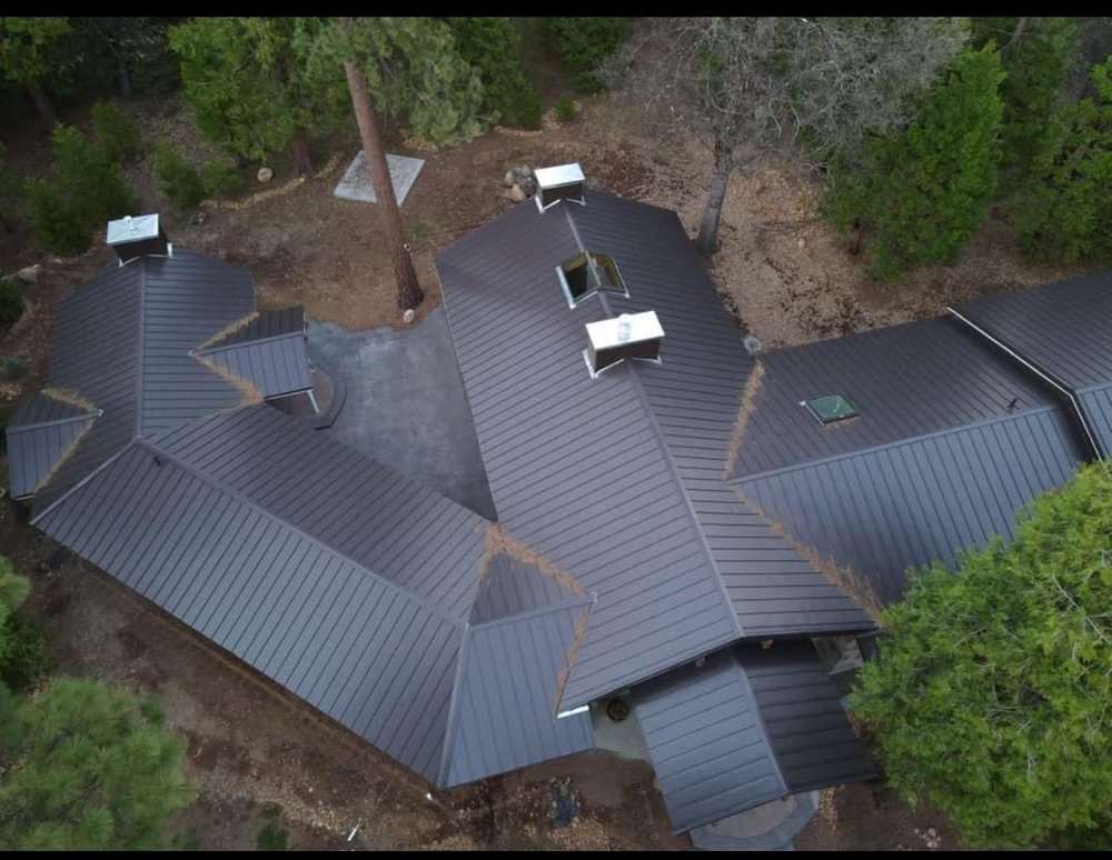 Slide of ZeZee Roofing