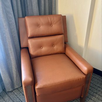 Courtyard by Marriott Rochester Mayo Clinic Area/Saint Marys - This corner chair is very cozy, it allows you to recline a little and has very supportive cushions - Hotels Near Me - Rochester, Minnesota Courtyard by Marriott Rochester Mayo Clinic Area/Saint Marys - This corner chair is very cozy, it allows you to recline a little and has very supportive cushions - Hotels Near Me - Rochester, Minnesota