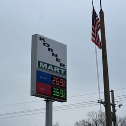 Korner Mart - Store gas price sign by main road