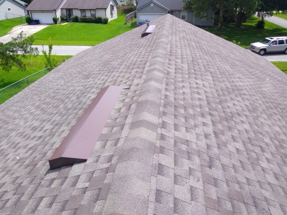 Slide of Patriot Roofing Services