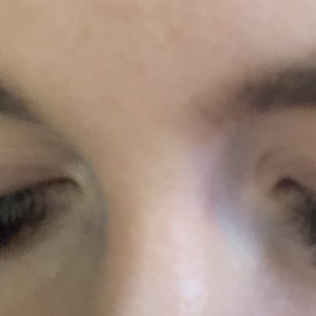 Charmed Lashe Studio - Looking down- new lash set done by Nelly - Eyelash Service Near Me - Oak Park, Illinois