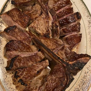 Wolfgang's Steakhouse - Steak for four: we got the porterhouse and NY strip and both were delicious even without the steak sauce. - Steakhouses Near Me - Honolulu, Hawaii Wolfgang's Steakhouse - Steak for four: we got the porterhouse and NY strip and both were delicious even without the steak sauce. - Steakhouses Near Me - Honolulu, Hawaii