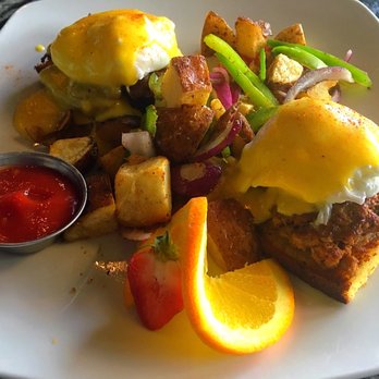 Confusion Corner Drinks + Food - Chorizo egg Benedict with side potatoes - Bars Near Me - Winnipeg, Manitoba Confusion Corner Drinks + Food - Chorizo egg Benedict with side potatoes - Bars Near Me - Winnipeg, Manitoba