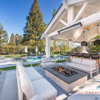 Creative Environments - Pool with pavilion that has a wet bar, gas fire pit and entertainment patio - Pool & Hot Tub Service Near Me Creative Environments - Pool with pavilion that has a wet bar, gas fire pit and entertainment patio - Pool & Hot Tub Service Near Me