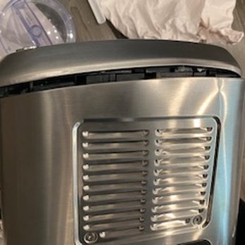 Clutter - Smashed appliance is broken beyond repair - Self Storage Near Me