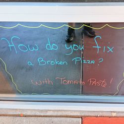 Rocco's NY Pizzeria - In the window