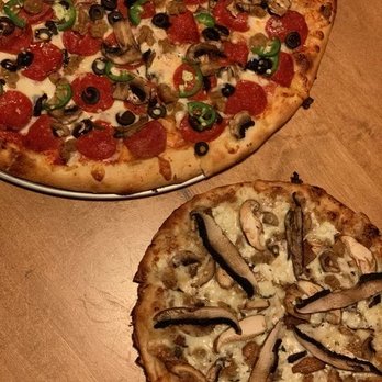 Zeeks Pizza - Dragon (with mushrooms and olives) and the Legion of Shrooms! - Pizza Near Me - Lynnwood, Washington Zeeks Pizza - Dragon (with mushrooms and olives) and the Legion of Shrooms! - Pizza Near Me - Lynnwood, Washington