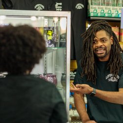 Lifestyles of Waterbury - Lifestyles employee recommending products to a customer.