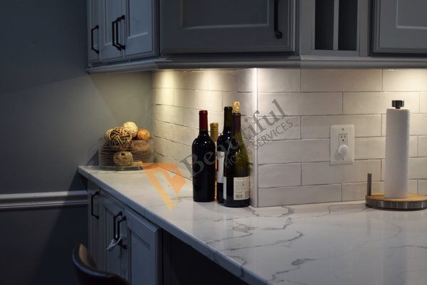 DC Kitchen Remodel 2019 - NE DC Kitchen remodel completed in 2019. The wall and doorway separating the living and dining rooms were removed to open up the space. The kitchen was completely remodeled.