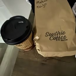 To go cappuccino, breakfast burrito To go cappuccino, breakfast burrito