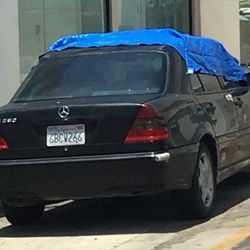 7-Eleven - Does someone live in this out of state parked vehicle?