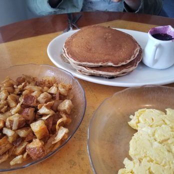 Lighthouse Cafe - Potatoes side, 2 scrambled eggs, and the whole wheat blueberry pancakes. - Breakfast & Brunch Near Me - Sanibel, Florida Lighthouse Cafe - Potatoes side, 2 scrambled eggs, and the whole wheat blueberry pancakes. - Breakfast & Brunch Near Me - Sanibel, Florida
