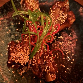 Tiki Kai - Ribs, fair amount of meat on the bone. Messy, but that's why we love them - Tiki Bars Near Me - Hermosa Beach, California Tiki Kai - Ribs, fair amount of meat on the bone. Messy, but that's why we love them - Tiki Bars Near Me - Hermosa Beach, California