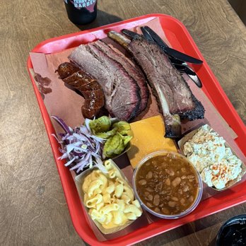 Terry Black's Barbecue - Waco - Brisket, jalapeño cheddar sausage and beef rib.  Sides: Mac and cheese, bbq beans and potato salad - Barbeque Near Me - Waco, Texas