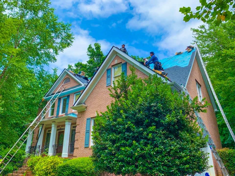 Slide of RST Roofing and Renovations