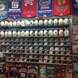 Globall Sports - Large selection of mini helmets and footballs