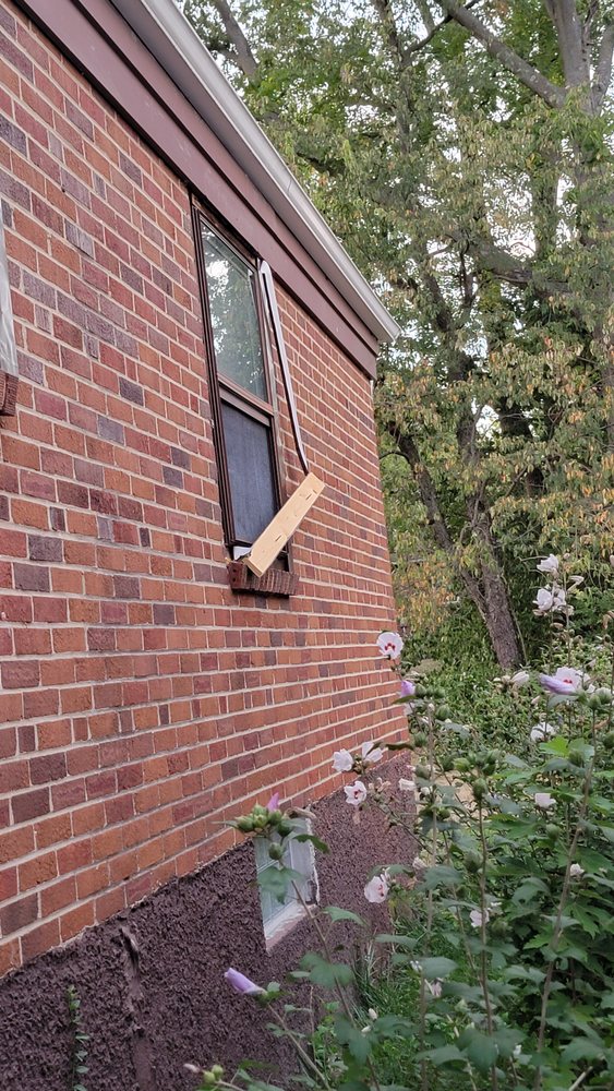 Slide of Menny Roofing