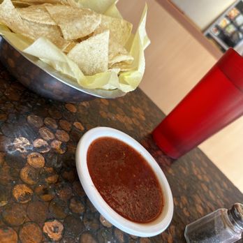 Chela's Tacos - a bowl of chips and a bowl of salsa - Mexican Near Me - San Antonio, Texas Chela's Tacos - a bowl of chips and a bowl of salsa - Mexican Near Me - San Antonio, Texas