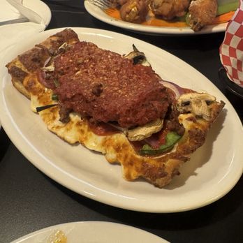 Rocco's Little Chicago - Kitchen Sink deep dish pizza slice - Pizza Near Me - Tucson, Arizona Rocco's Little Chicago - Kitchen Sink deep dish pizza slice - Pizza Near Me - Tucson, Arizona